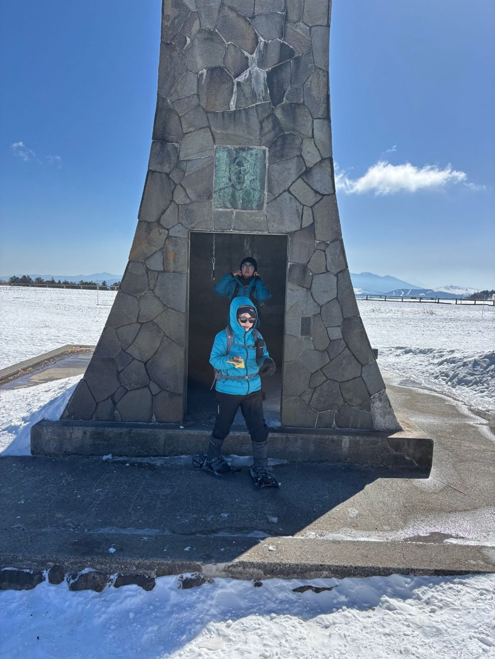 A young guest on snowshoes at the Utsukushi-no-To tower on Utsukushigahara